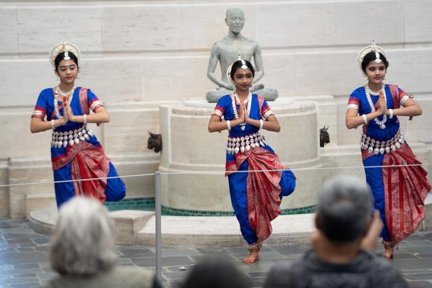Three Indian dancers during a Diwali performance at Seattle Asian Art Museum